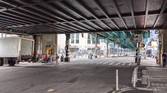 Road in the Bronx under subway
