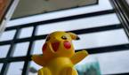 Pikachu toy with a soft blur background
