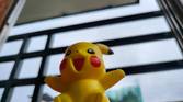 Pikachu toy with a soft blur background
