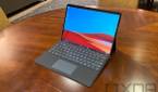 Surface Pro X in black on wooden table