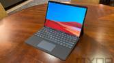 Surface Pro X in black on wooden table