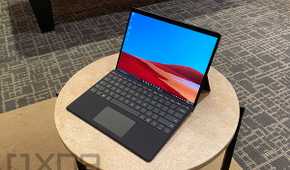 Surface Pro X in black on small table