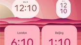 Light red Material You clock widgets in Android 12 Beta 5