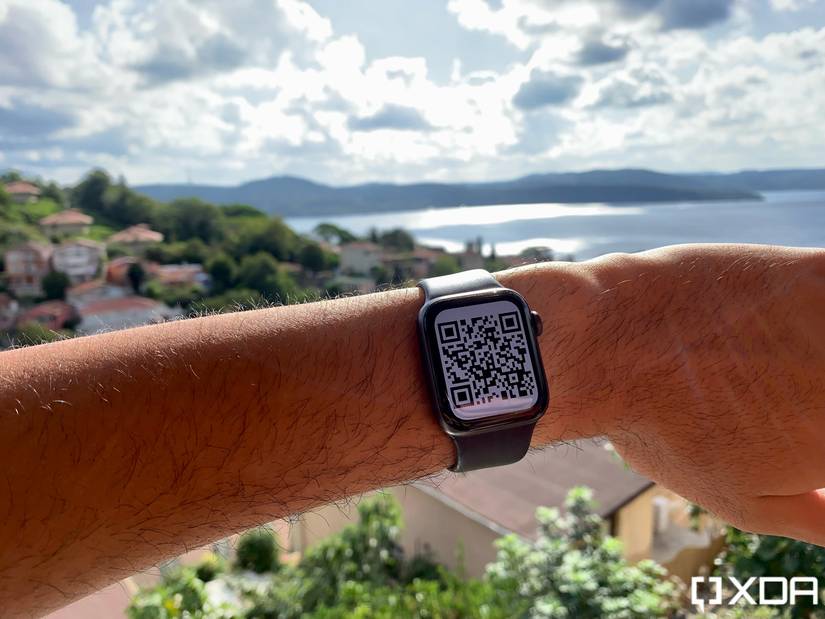 Worn Apple Watch displaying vaccination QR code