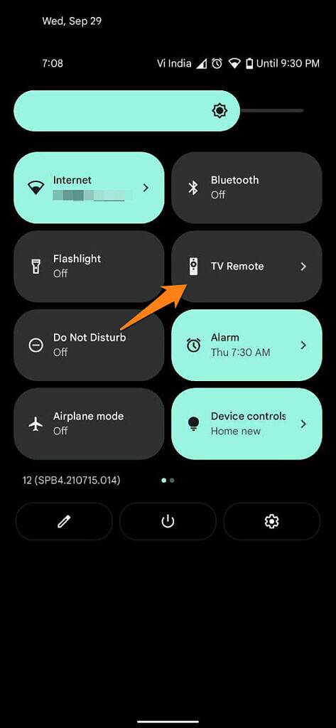 Android Quick Settings with arrow pointing at TV Remote tile