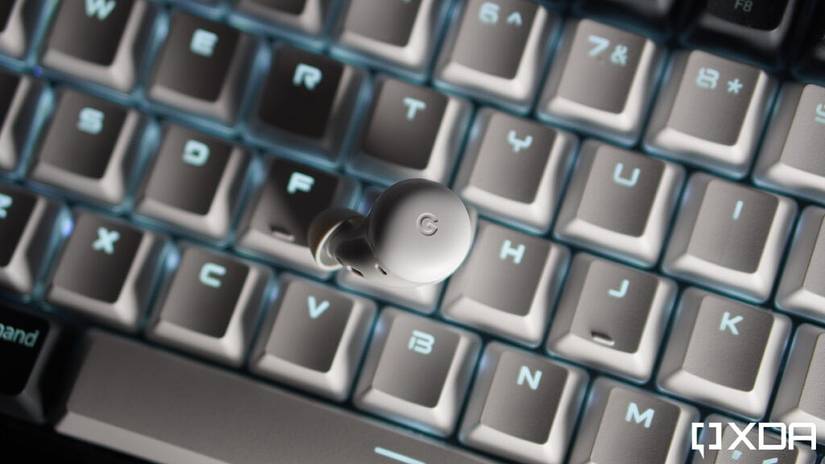 Single earbud on keyboard