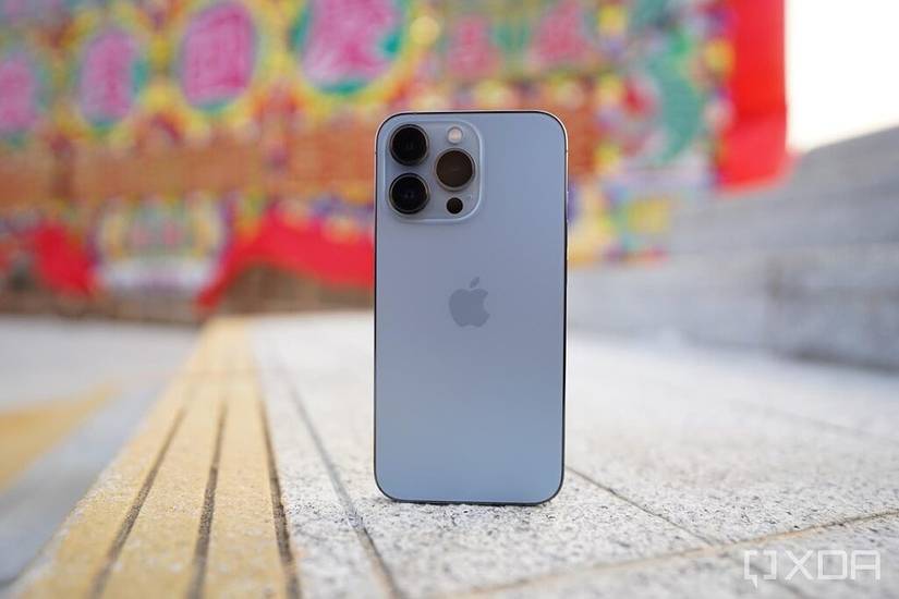 iPhone 13 Pro in blue standing straight up