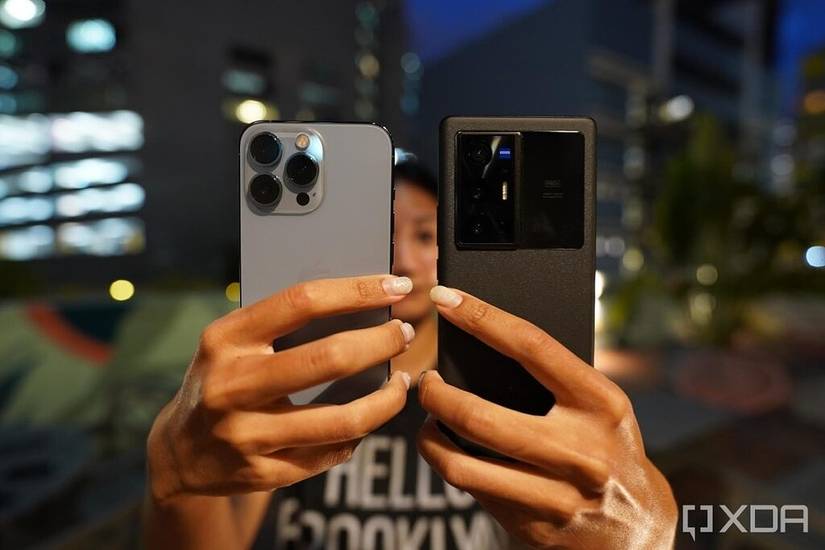 Vivo's X70 Pro Plus and iPhone 13 Pro in the hand