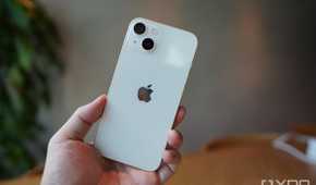 An iPhone 13 in the hand.