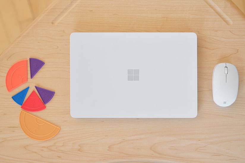 Surface Laptop SE with mouse