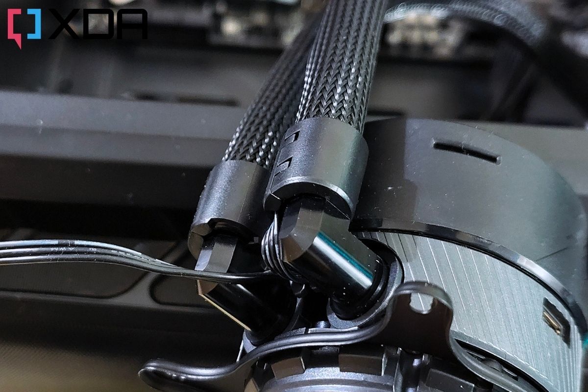 Black colored tube fittings on a CPU waterblock