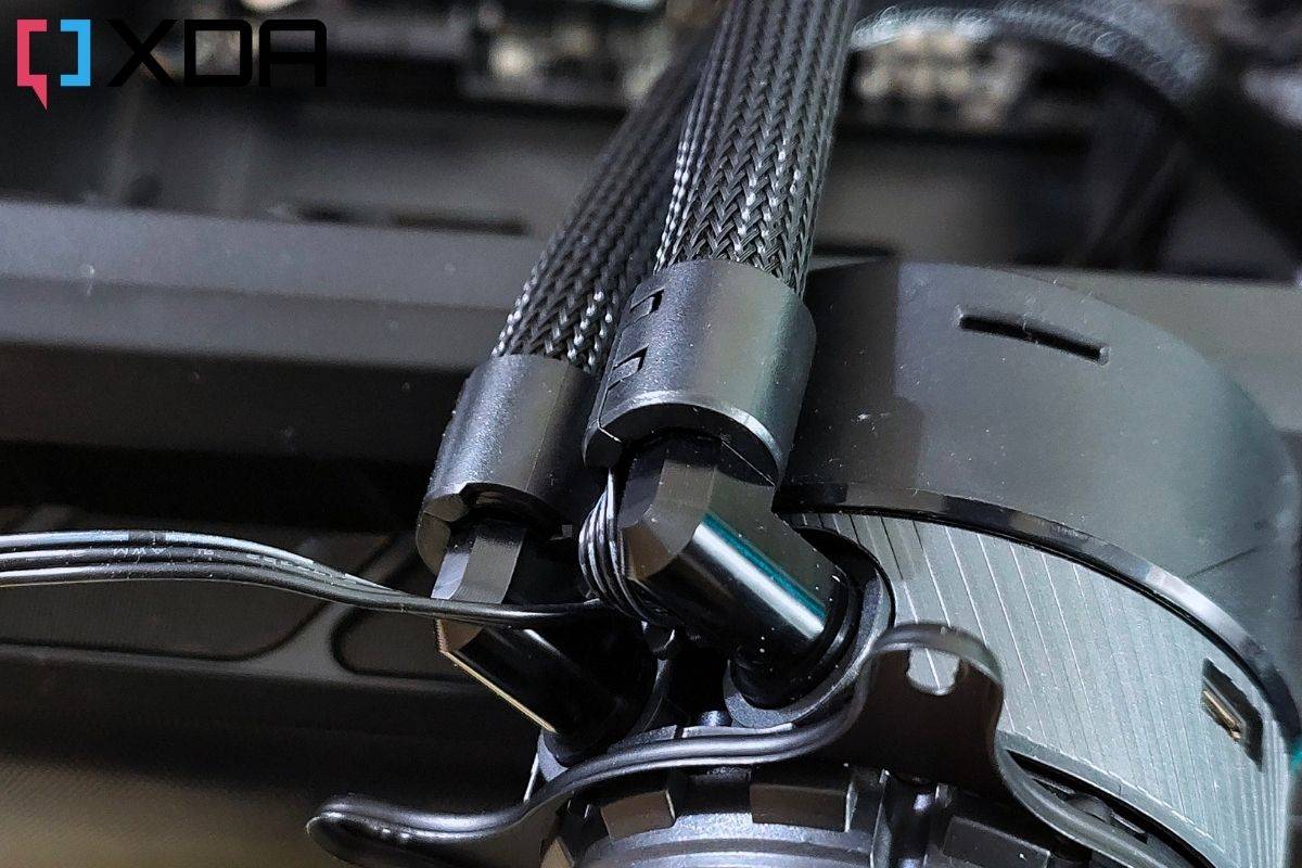 Black colored tube fittings on a CPU waterblock