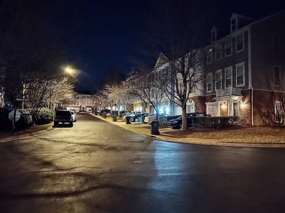 Photo of a street at night