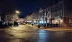 Photo of a street at night