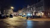 Photo of a street at night