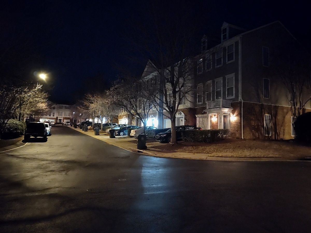 Photo of a street at night