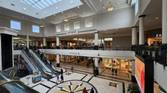 Wide-angle photo of the inside of a mall