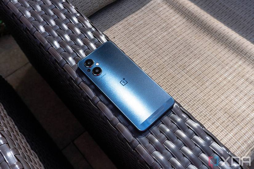 Blue phone on brown chair