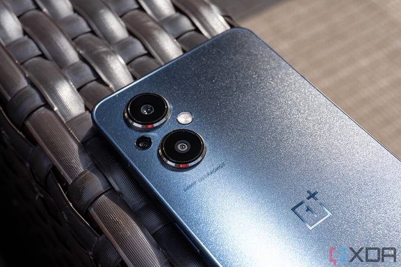 Blue phone on brown chair