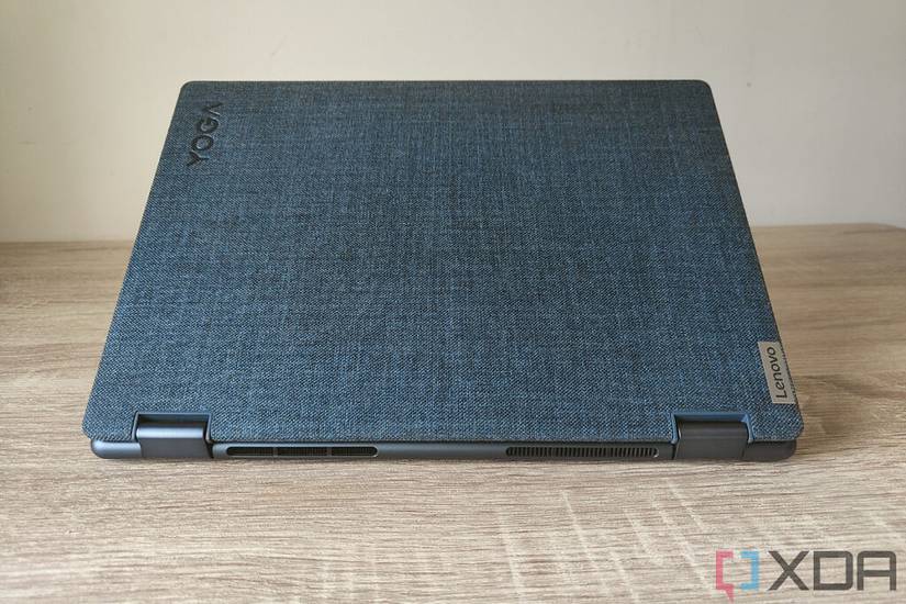 Rear view of the Lenovo Yoga 6 Gen 7 showing off the fabric-covered lid and rounded edges around the base