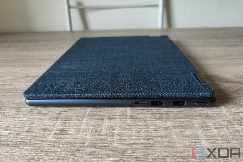 Right-side view of the Lenovo Yoga 6 Gen 7 with the lid closed showing two USB Type-A ports, a microSD card reader, and a power button.