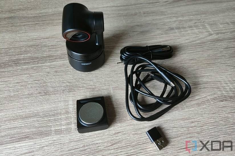 Obsbot Tiny 4K webcam along with the included accessories and cables