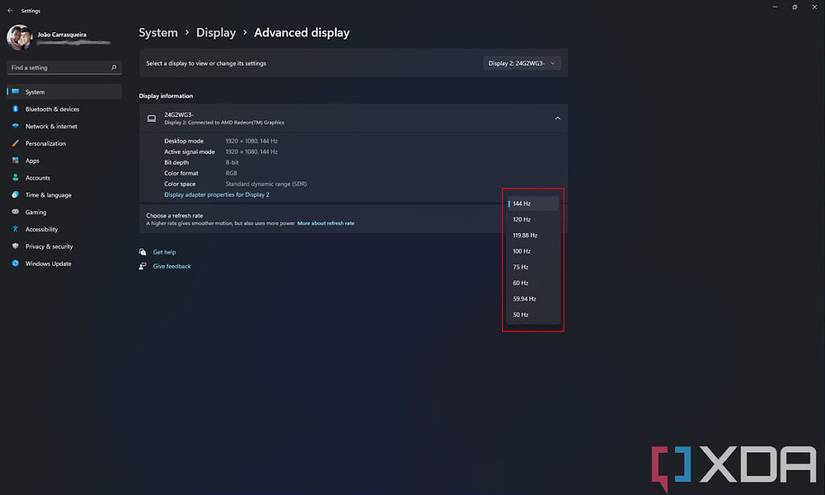 Windows 11 display settings refresh rate dropdown menu interface