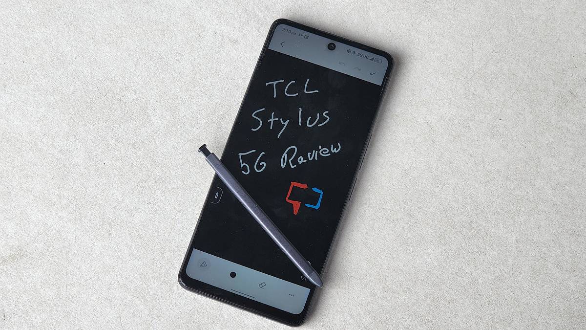 TCL Stylus 5G on a white table with the stylus on the screen.