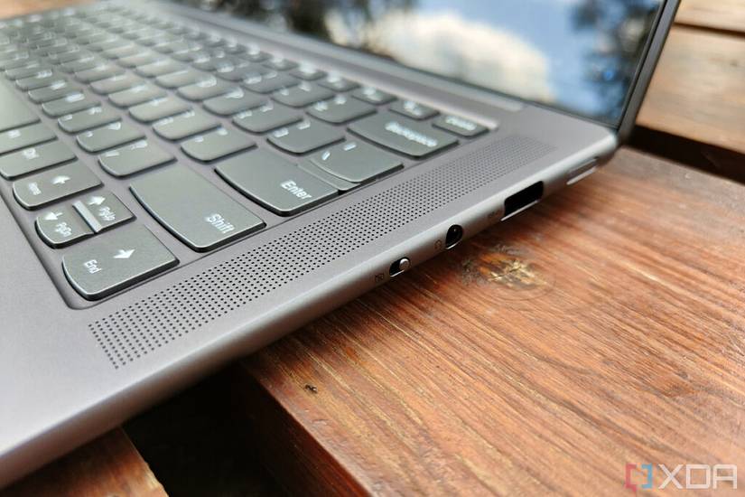 Close-up view of the ports and speaker grill on the right side of the Lenovo Slim 7 Pro X
