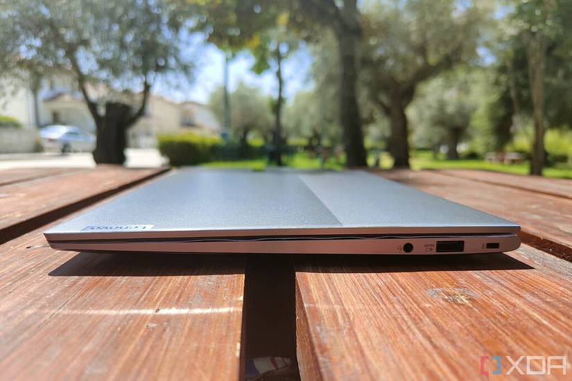 Right-side view of the Lenovo ThinkBook 13s with the lid closed, showing one USB Type-A port, a headphone jack, and a security slot