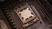 Angled view of AMD Ryzen 7950X installed on a motherboard