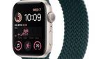 Starlight Apple Watch SE 2 with Braided Solo Loop band on white background.
