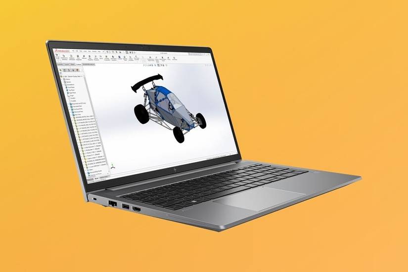 Angled view of the HP ZBook Power G9 over a yellow and orange gradient background