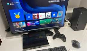 A Surface Pro 8 and Xbox hooked up to the Samsung Smart Monitor M7