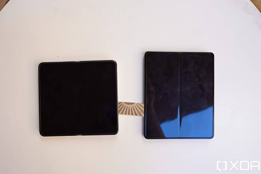 The Oppo Find N's nearly crease-less screen (left) next to Samsung's foldable with a very noticeable harsh crease (right). 