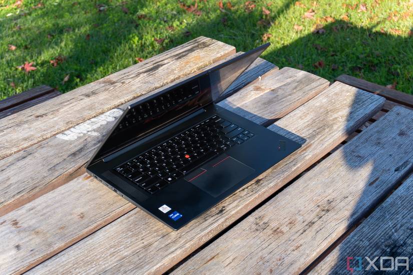 A Lenovo ThinkPad X1 Extreme Gen 5 laptop seen from the front at a left-side angle with the lid open at roughly 60 degrees