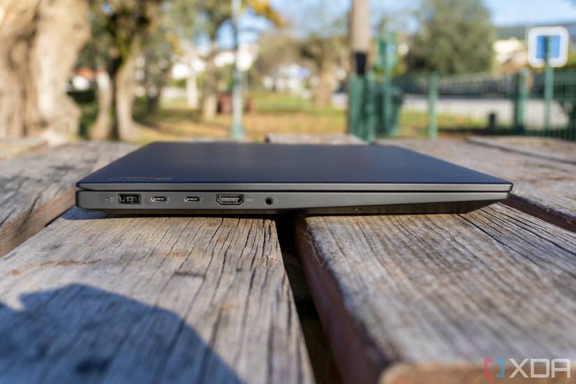 A left-side view of the Lenovo ThinkPad X1 Extreme Gen 5 laptop, showing a charging port, two Thunerbolt 4 ports, HDMI, and a 3.5mm headphone jack