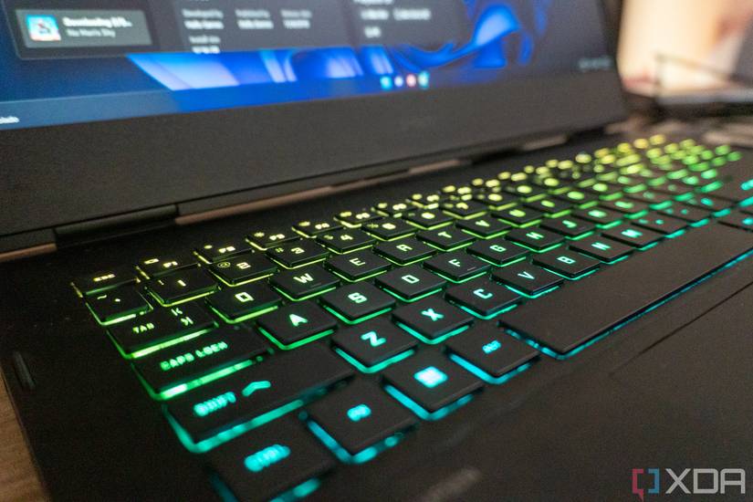 Close-up view of the keyboard on the Omen 16 with the RGB keyboard lit up in various colors