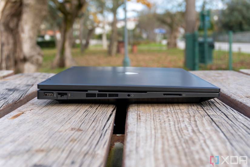 Side view of the Omen 16 laptop with the lid closed, showing one USB Type-A port, an RJ45 Ethernet port, a 3.5mm headphone jack and a full-size SD card reader