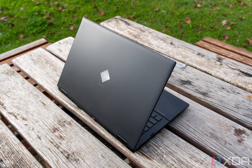 Rear angled view of the Omen 16 laptop with the lid open at about 60 degrees