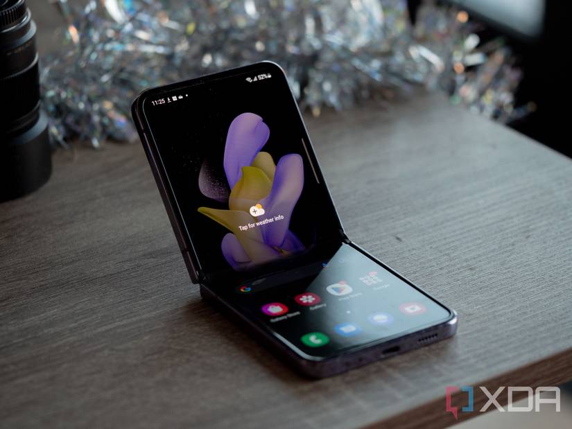 A Galaxy Z Flip 4 open and resting on a desk