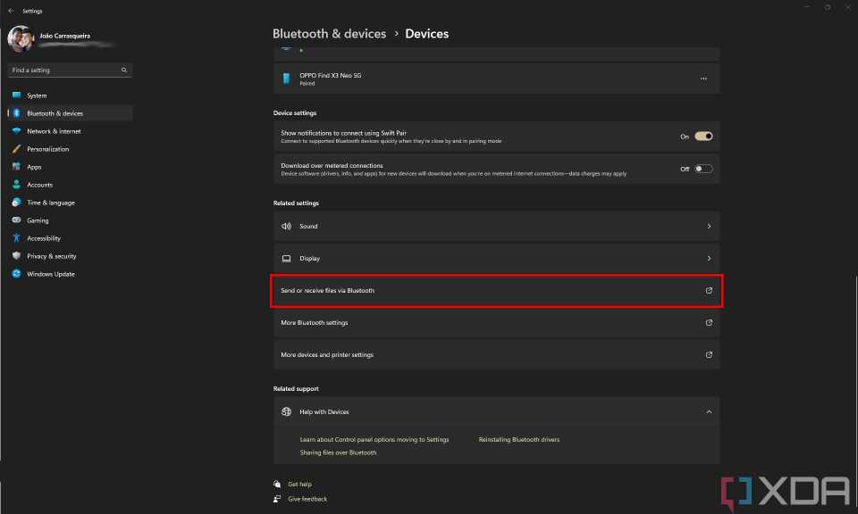 Screenshot of the Settings app in Windows 11 showing the option to send or receive files via Bluetooth