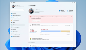 Screenshot of the Windows 11 Settings app showing updating cloud storage information for a linked Microsoft account, including OneDrive storage and Outlook attachments