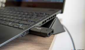 Close-up view of a USB flash drive plugged into a Windows 11 laptop