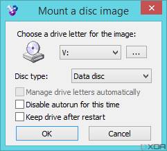 Screenshot of a WinCDEmu prompt with various settings for mounting an ISO file to a virtual drive.