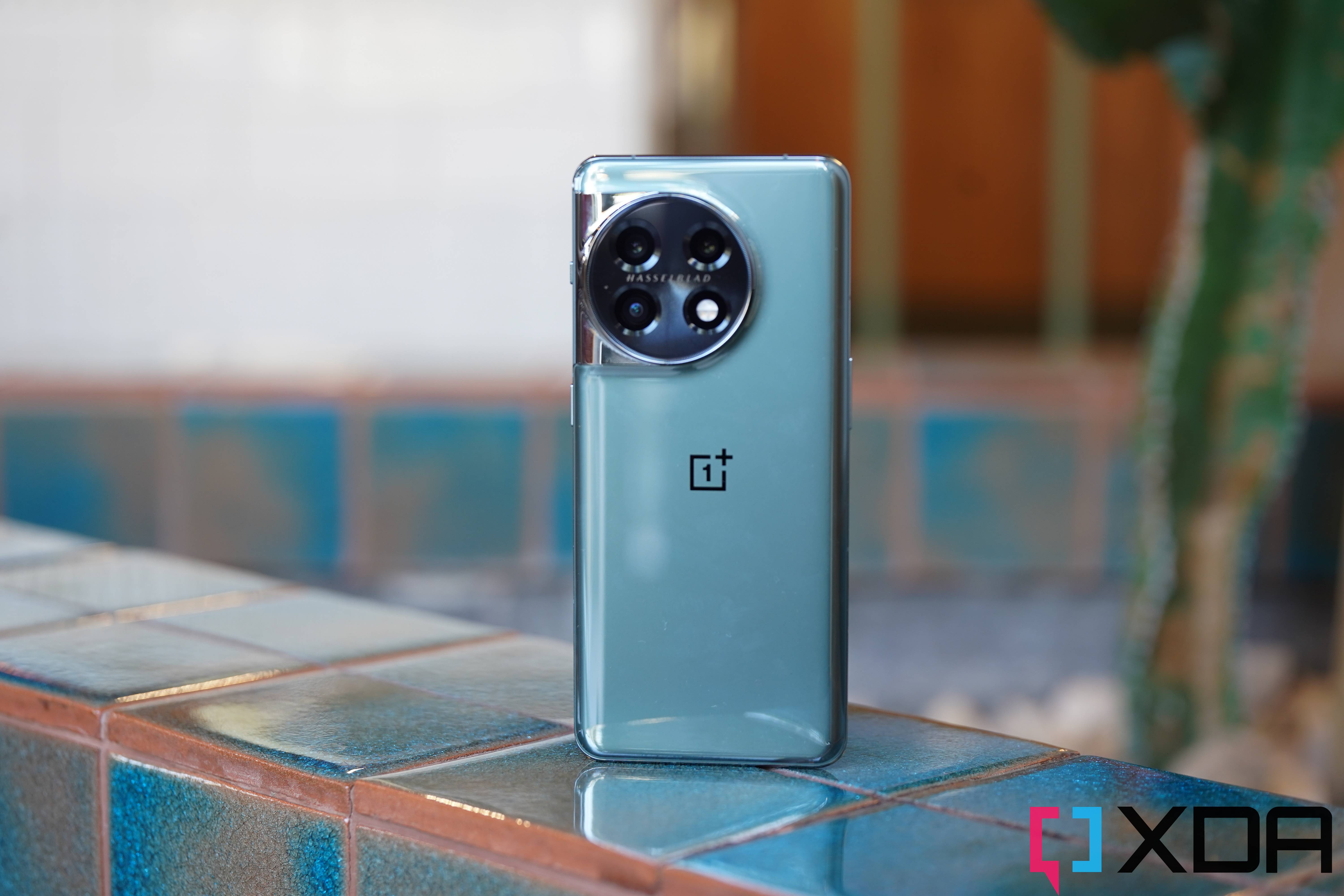 oneplus 11 in green standing up