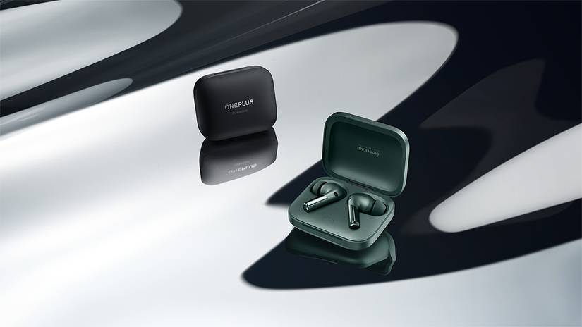 OnePlus Buds Pro 2 in green and black on black and white background