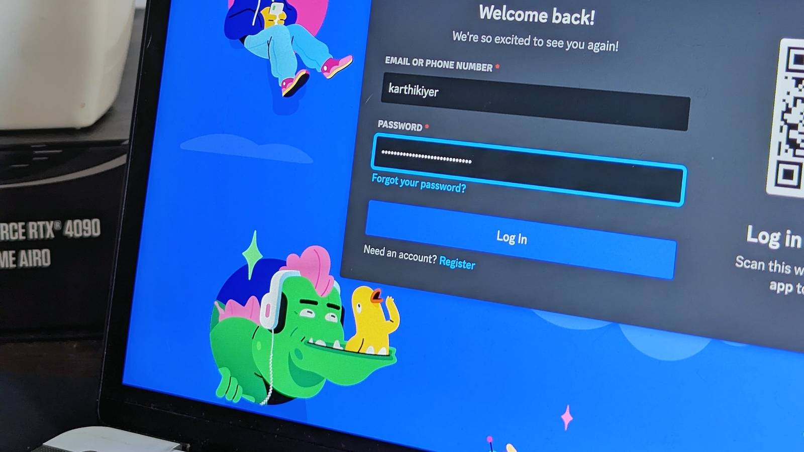 An image showing the login page of discord on a MacBook Air's display.