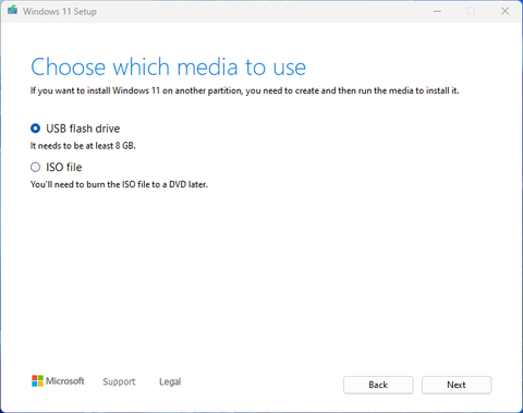 Screenshot of the Windows 11 Media Creation Tool showing options to use a USB flash drive or ISO file as installation media