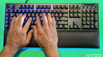 A man with his hands on the Razer Blackwidow V4 Pro Keyboard
